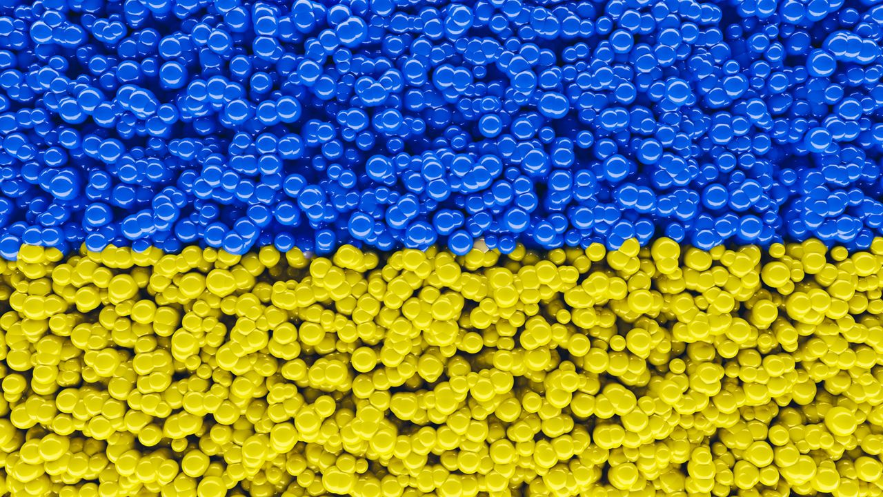 hero-img-02 A vibrant abstract pattern in blue and yellow resembling the Ukrainian flag.